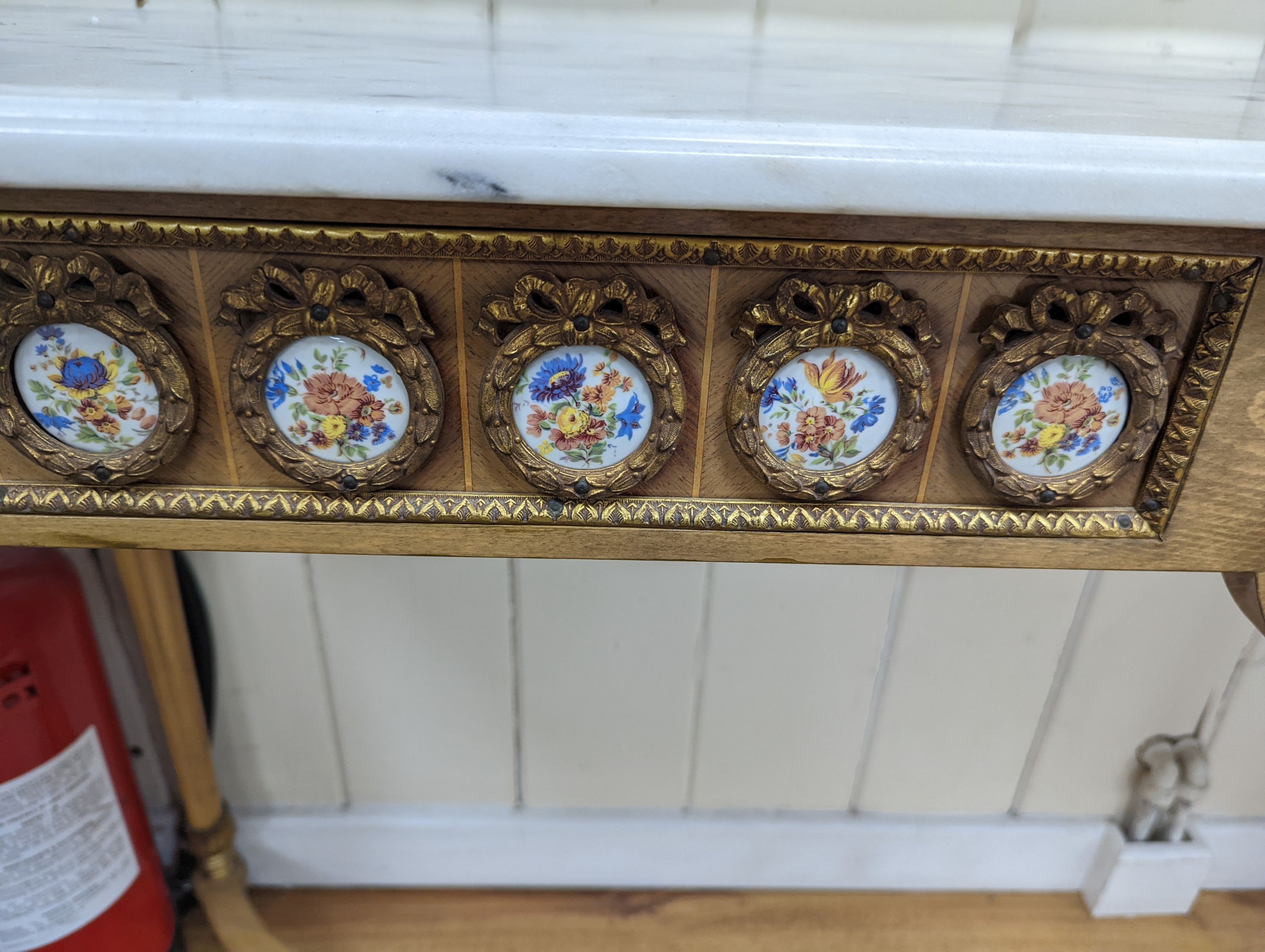A Louis XVI style gilt metal and marble top console table, width 133cm, height 81cm